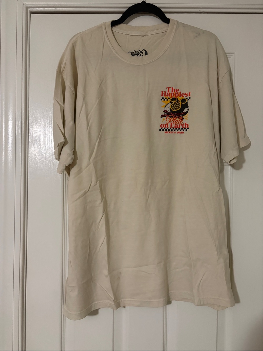 Cream Short-Sleeve Graphic Tee with Small Chest Print
